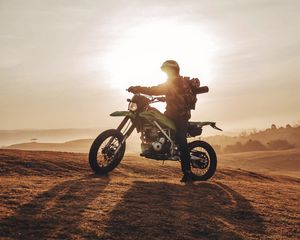 Preview wallpaper motorcyclist, motorcycle, dawn, indonesia