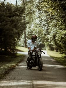 Preview wallpaper motorcyclist, motorcycle, helmet, road, summer
