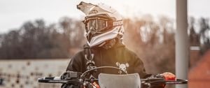 Preview wallpaper motorcyclist, motorcycle, helmet, sunlight