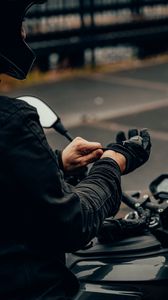 Preview wallpaper motorcyclist, motorcycle, helmet, gloves