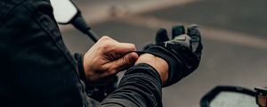 Preview wallpaper motorcyclist, motorcycle, helmet, gloves