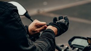 Preview wallpaper motorcyclist, motorcycle, helmet, gloves