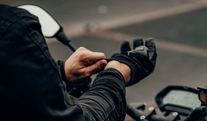 Preview wallpaper motorcyclist, motorcycle, helmet, gloves