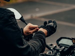 Preview wallpaper motorcyclist, motorcycle, helmet, gloves