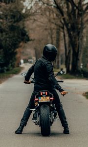 Preview wallpaper motorcyclist, motorcycle, helmet, road, rear view