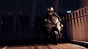 Preview wallpaper motorcyclist, motorcycle, helmet, night