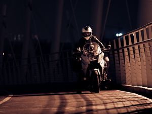 Preview wallpaper motorcyclist, motorcycle, helmet, night