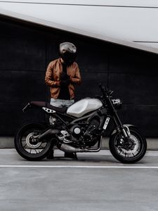 Preview wallpaper motorcyclist, motorcycle, helmet, gloves, black