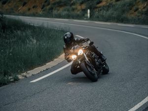 Preview wallpaper motorcyclist, motorcycle, helmet, racing, headlight, glow