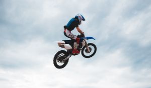 Preview wallpaper motorcyclist, motorcycle, helmet, stunt, jump