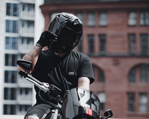 Preview wallpaper motorcyclist, motorcycle, helmet, bike, front view