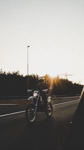 Preview wallpaper motorcyclist, motorcycle, road, movement