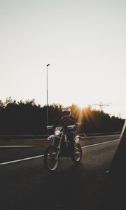 Preview wallpaper motorcyclist, motorcycle, road, movement