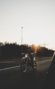 Preview wallpaper motorcyclist, motorcycle, road, movement