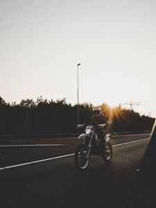Preview wallpaper motorcyclist, motorcycle, road, movement