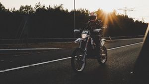 Preview wallpaper motorcyclist, motorcycle, road, movement