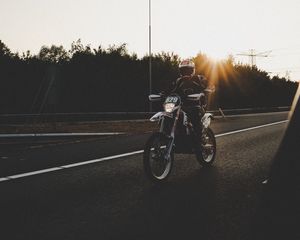 Preview wallpaper motorcyclist, motorcycle, road, movement