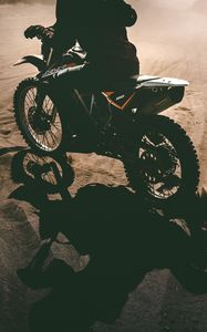 Preview wallpaper motorcyclist, motorcycle, sand