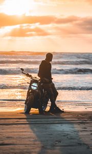 Preview wallpaper motorcyclist, motorcycle, silhouette, sunset, loneliness