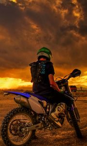 Preview wallpaper motorcyclist, motorcycle, sunset