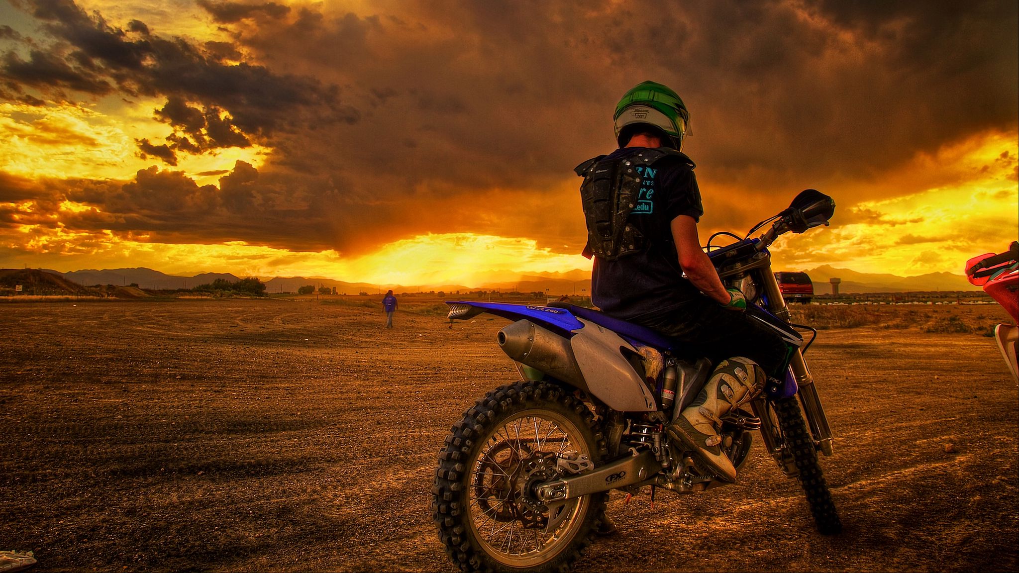 2048x1152 Wallpaper motorcyclist, motorcycle, sunset