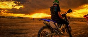 Preview wallpaper motorcyclist, motorcycle, sunset