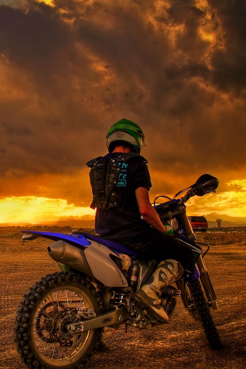 800x1200 Wallpaper motorcyclist, motorcycle, sunset