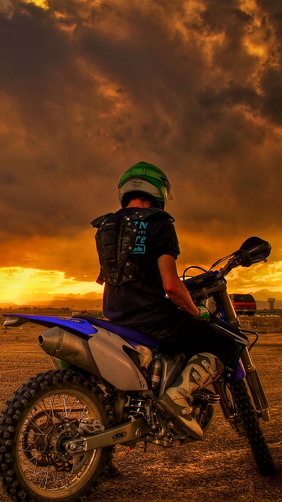 938x1668 Wallpaper motorcyclist, motorcycle, sunset