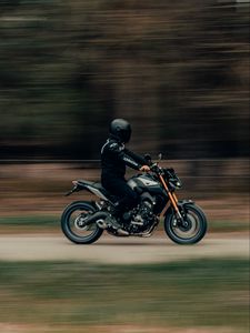 Preview wallpaper motorcyclist, movement, speed, helmet