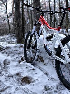 Preview wallpaper mountain bicycle, wood, traces, snow