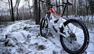 Preview wallpaper mountain bicycle, wood, traces, snow