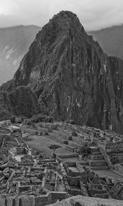 Preview wallpaper mountain, building, ruins, black and white