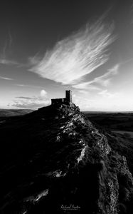 Preview wallpaper mountain, building, tower, sky, black and white