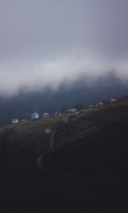 Preview wallpaper mountain, buildings, fog, cloud, aerial view, nature