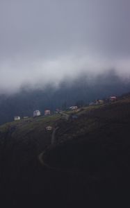 Preview wallpaper mountain, buildings, fog, cloud, aerial view, nature