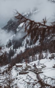 Preview wallpaper mountain, buildings, snow, trees, slope, aerial view