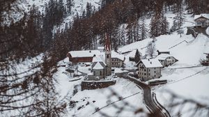 Preview wallpaper mountain, buildings, snow, trees, slope, aerial view