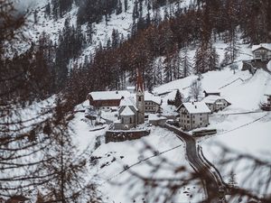 Preview wallpaper mountain, buildings, snow, trees, slope, aerial view