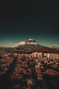 Preview wallpaper mountain, city, settlement, landscape, clouds