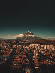 Preview wallpaper mountain, city, settlement, landscape, clouds