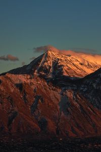 Preview wallpaper mountain, clouds, snow, dusk, landscape