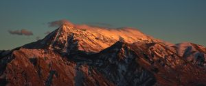 Preview wallpaper mountain, clouds, snow, dusk, landscape