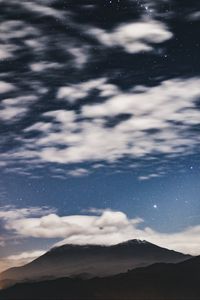 Preview wallpaper mountain, clouds, stars, dusk, long exposure