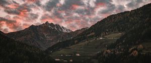 Preview wallpaper mountain, clouds, village, forest, trees, sunset