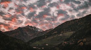 Preview wallpaper mountain, clouds, village, forest, trees, sunset