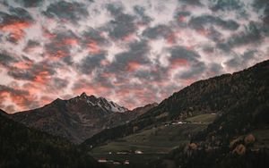 Preview wallpaper mountain, clouds, village, forest, trees, sunset