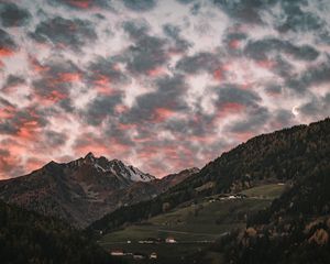 Preview wallpaper mountain, clouds, village, forest, trees, sunset