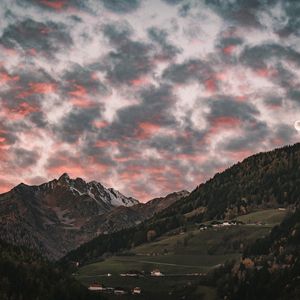 Preview wallpaper mountain, clouds, village, forest, trees, sunset