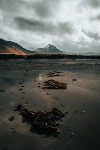 Preview wallpaper mountain, coast, sand, footprints, landscape