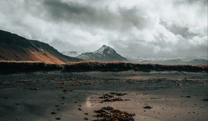 Preview wallpaper mountain, coast, sand, footprints, landscape